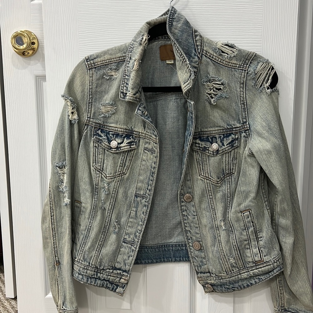 Distressed denim jacket